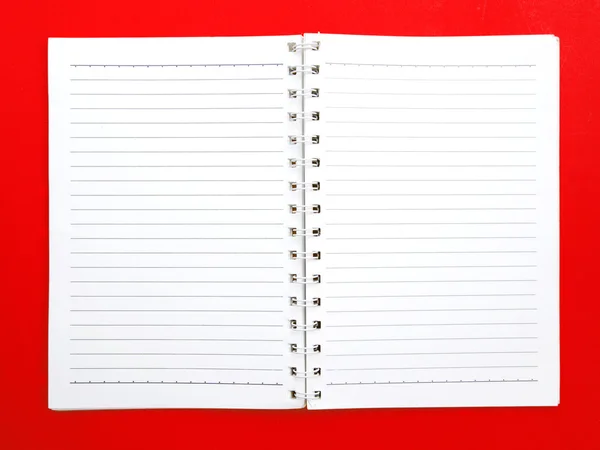 Blank ring book on red background — Stock Photo, Image