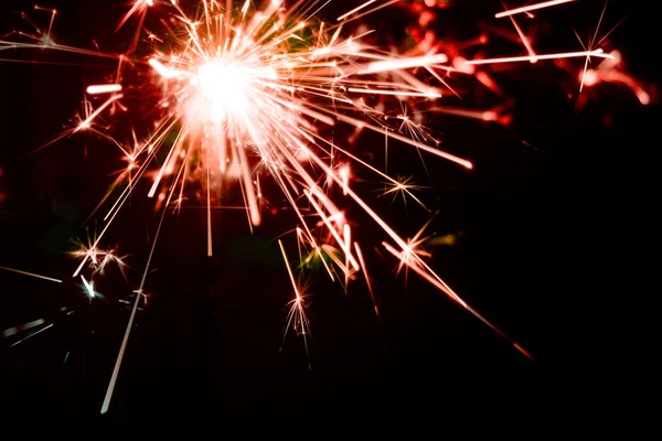 Fundo de férias com um sparkler — Fotografia de Stock