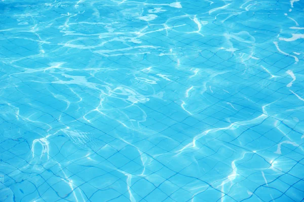 Fondo de agua ondulado piscina azul — Foto de Stock