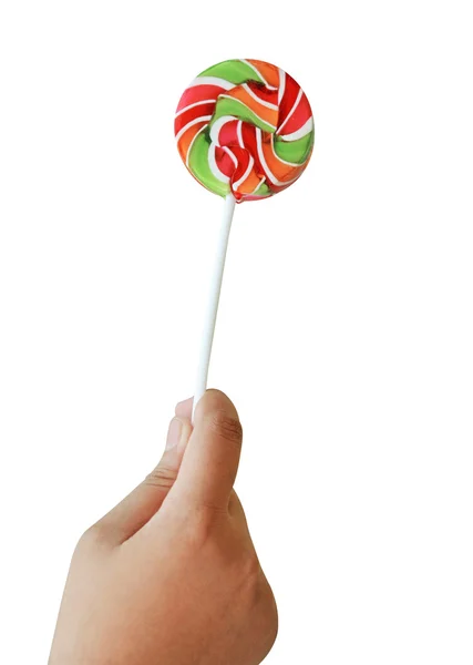 Hand holding lollipop isolate (clipping path) — Stock Photo, Image