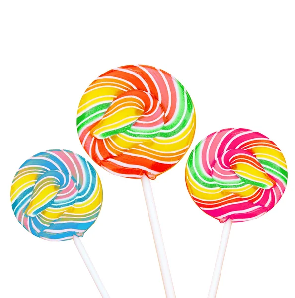 Kleurrijke spiraal lollies op witte achtergrond — Stockfoto