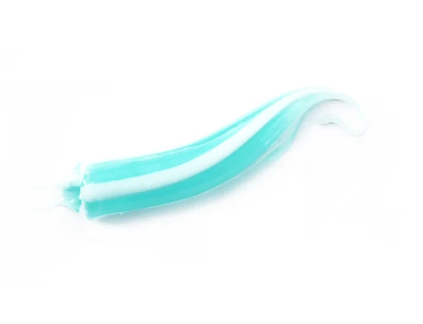 Geïsoleerde tandpasta monster op witte achtergrond — Stockfoto