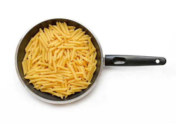 Raw pasta in pan isolate on white — Stock Photo, Image