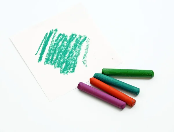 Crayons and white paper — Stock Photo, Image