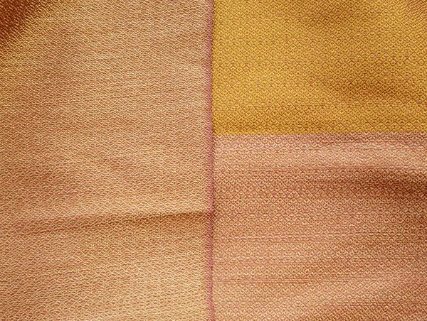 Tessuto dorato texture sfondo — Foto Stock