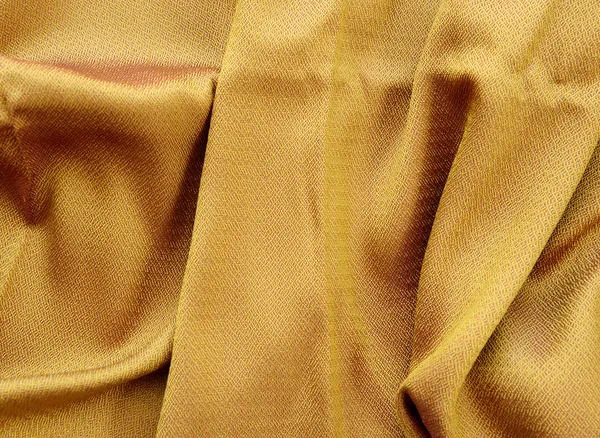 Silk golden fabric texture — Stock Photo, Image