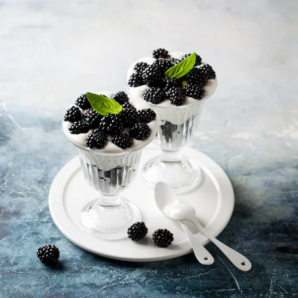 Nut milk dessert with blackberries
