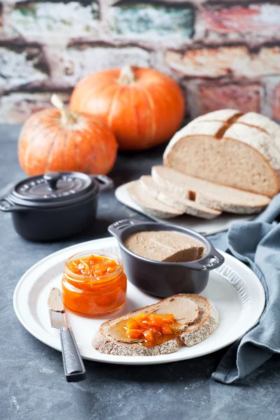 Liver pate and pumpkin orange marmalade on toast whole grain bread — Stock Photo, Image