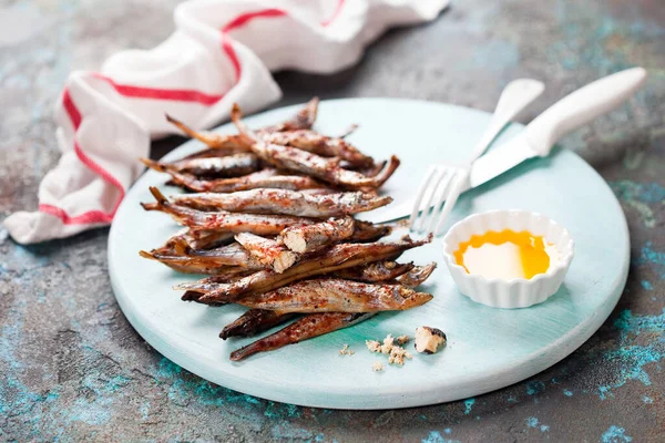 Fried Capelin Fish Butter Sauce Wooden Plate Selective Focus — Stock Photo, Image