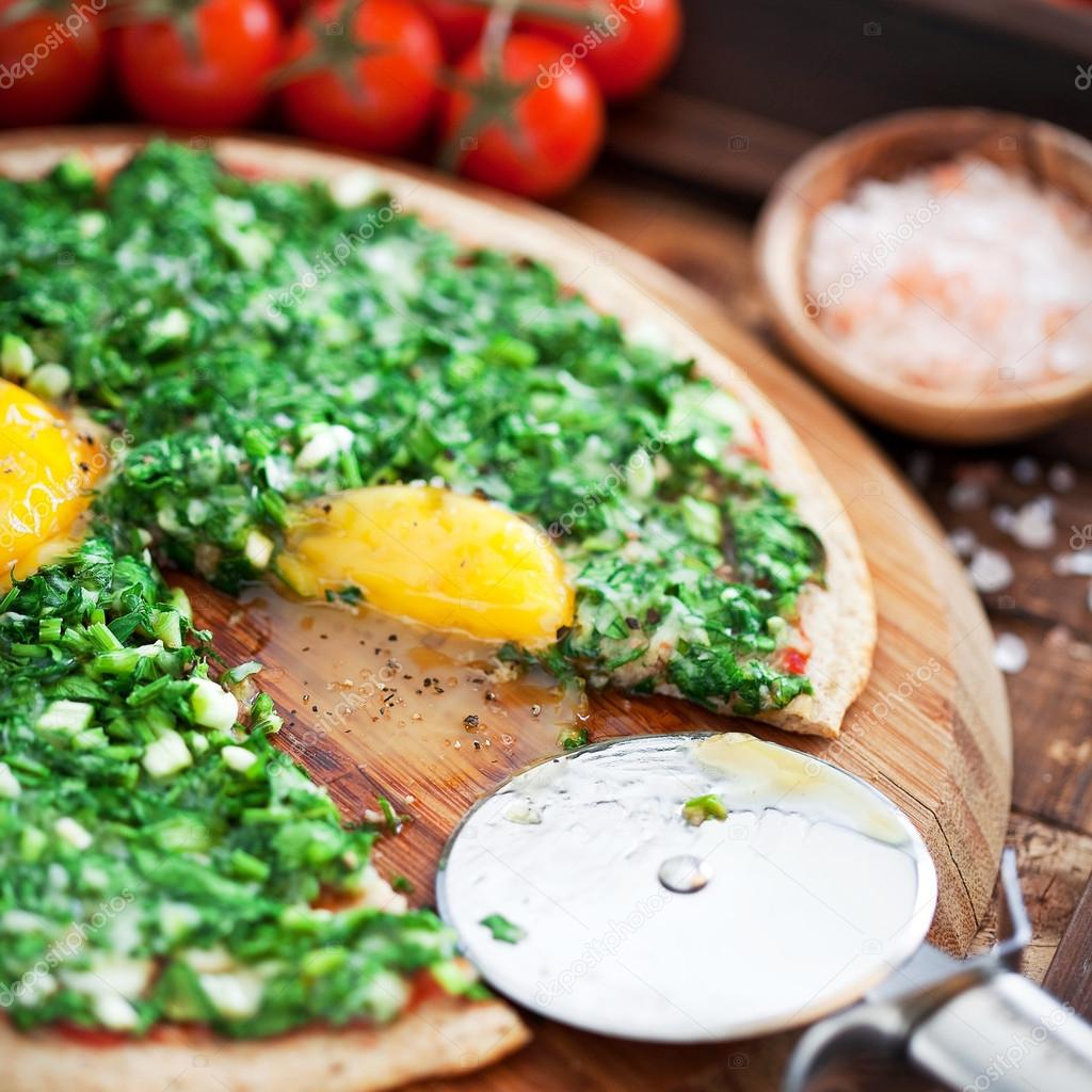 Pizza with herbs and eggs — Stock Photo © laperla_foto 51843511