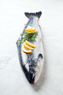 Fresh whole salmon with lemon