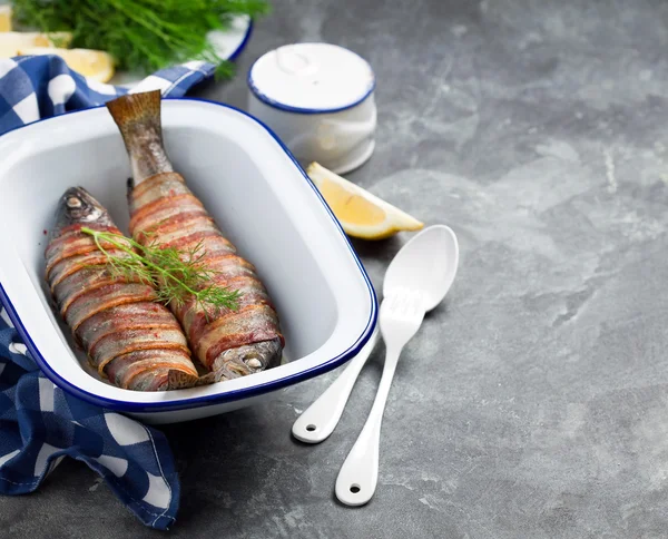 Baked trout with bacon and dill — Stock Photo, Image