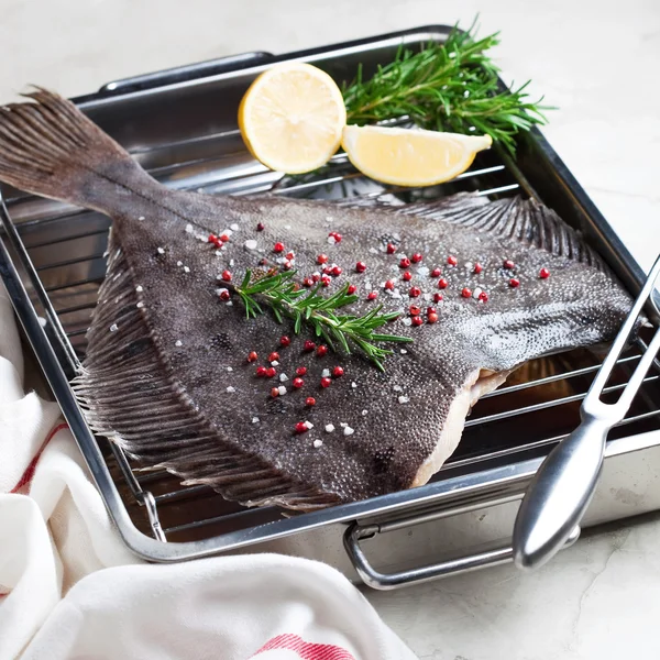 Fish flounder with spices — Stock Photo, Image