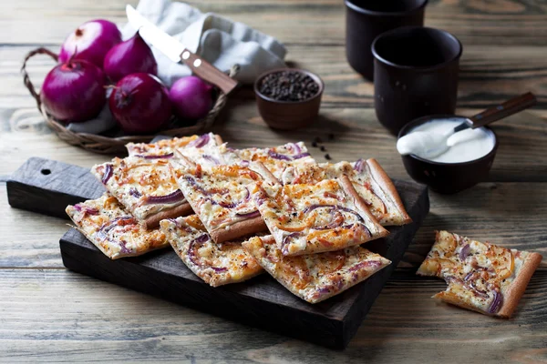 Tart flambee with purple onions — Stock Photo, Image