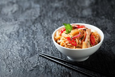 Noodles with vegetables and chicken clipart