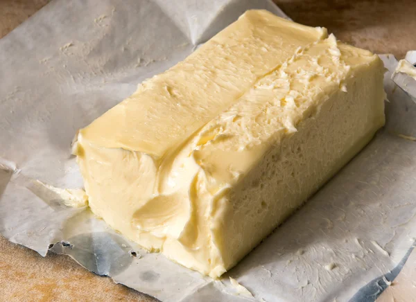 Close up on large pat of butter — Stock Photo, Image