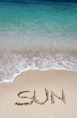 Güneş altın sahil kumu yazılı kelime