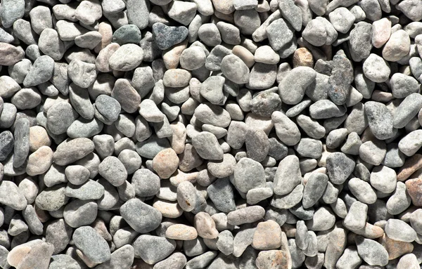 Background texture of waterworn stones — Stock Photo, Image