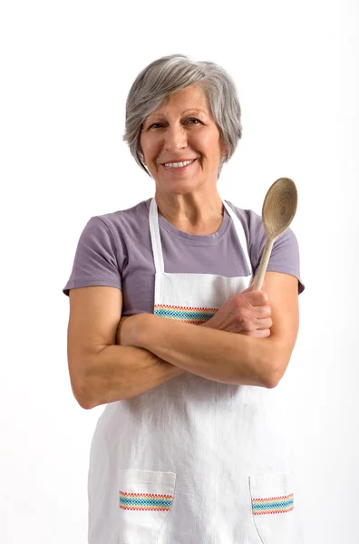 Señora mayor sosteniendo una cuchara de madera —  Fotos de Stock