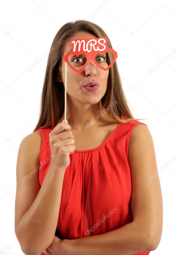 Young Woman Holding Photo Booth Prop