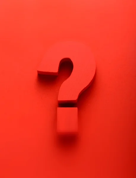 Red question mark on a red background