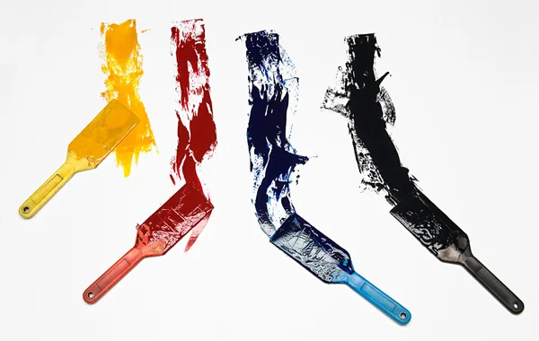 各種着色されたペンキと概念のブラシ ロイヤリティフリーのストック画像