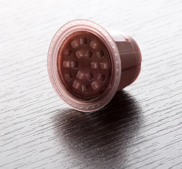 Instant Coffee Pod on Wooden Surface — Stock Photo, Image