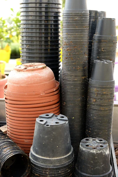 Stacks of flowerpots at a nursery or store — Stock Photo, Image