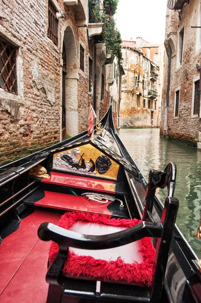 Taking a tour in a Venetian gondola — Stock Photo, Image