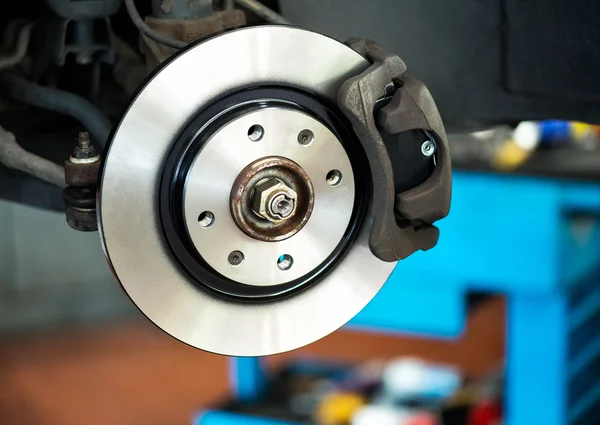 Brand new brake disc on car — Stock Photo, Image