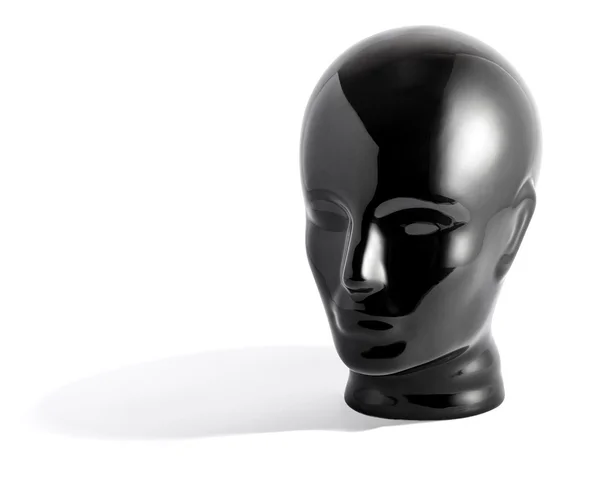 Glänsande svart skyltdocka huvud på vit bakgrund — Stockfoto