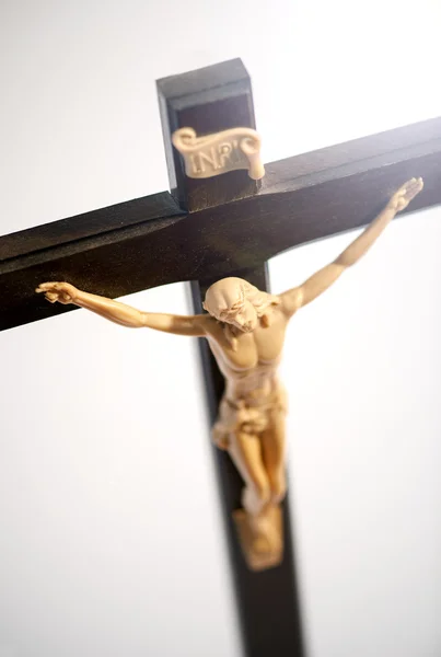 Ukrzyżowanego Chrystusa na szczegół zbliżenie krzyż — Zdjęcie stockowe