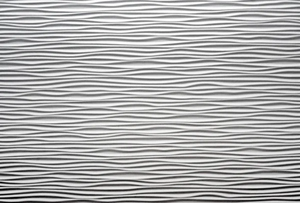Hvit, teksturert bølgevegg – stockfoto
