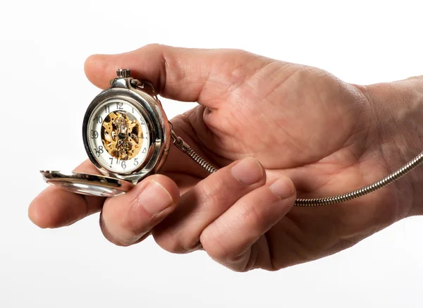 Hombre sosteniendo un reloj de bolsillo cazador completo — Foto de Stock