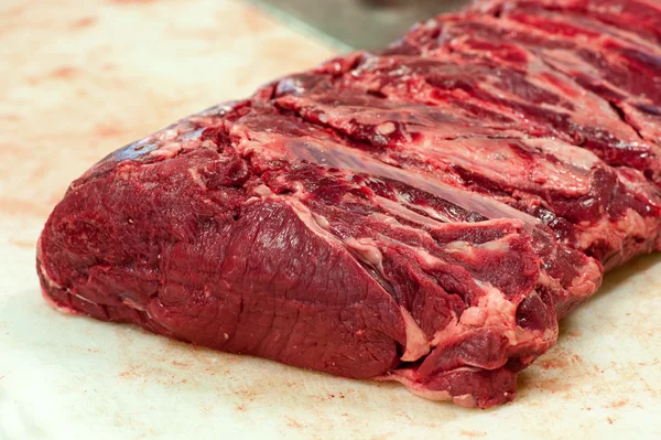 Part of raw beef section in butchery — Stock Photo, Image