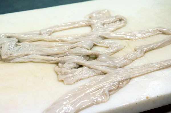 Raw marrow pulled from long bones in a butchery — Stock Photo, Image