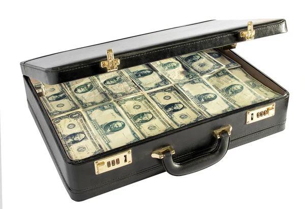 Black leather briefcase packed with money Royalty Free Stock Photos