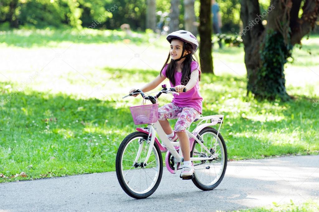 The Girl Is Riding A Bike | rededuct.com