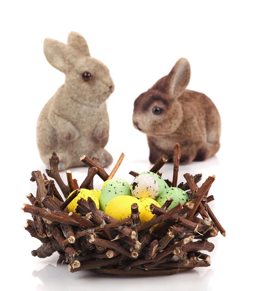 Bunnies with Easter eggs — Stock Photo, Image