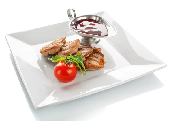 Grilled serving steak with tomato, fresh herbs and sauce — Stock Photo, Image