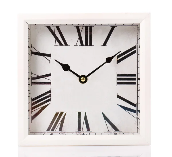 Horloge vintage sur fond de surface blanche — Photo