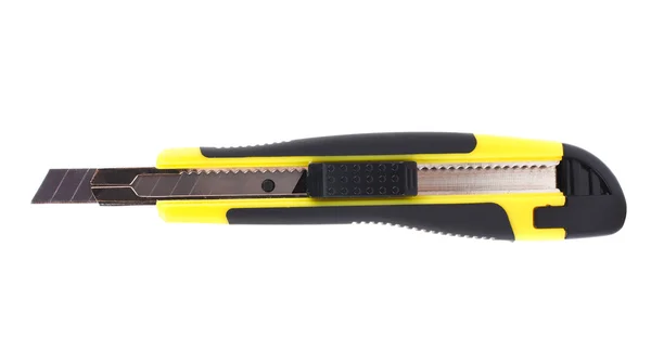 Yellow stationery knife — Stock Photo, Image