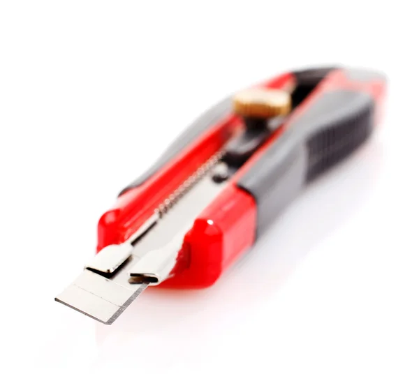 Cuchillo de papelería rojo — Foto de Stock