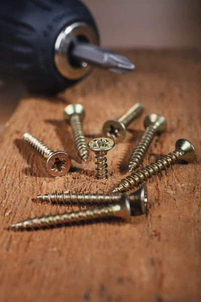 Electric drill and screws — Stock Photo, Image