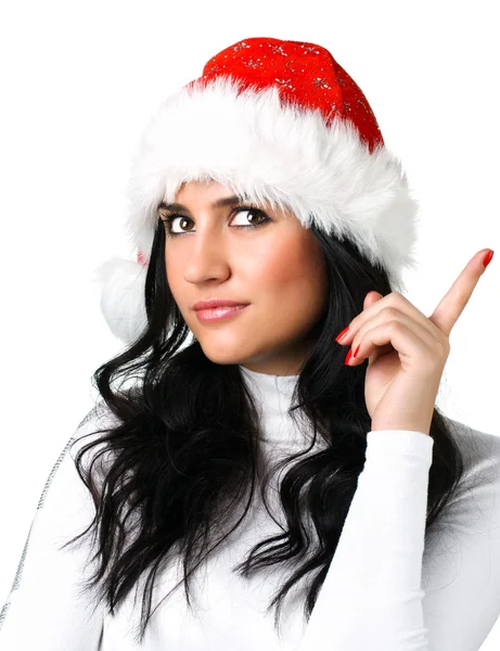 Красивая девушка в шляпе Санта-Клауса — стоковое фото