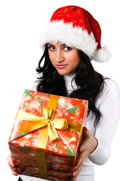 Piękna dziewczyna w kapeluszu Świętego Mikołaja z prezentem — Zdjęcie stockowe
