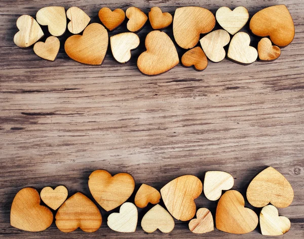 Background with woooden hearts — Stock Photo, Image