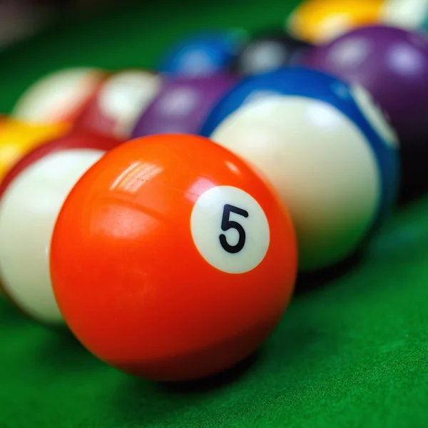 Billiard balls on a green pool table, closeup — Stock Photo, Image