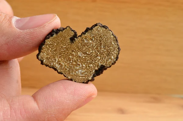 Tartufo a forma di cuore in mano — Foto Stock