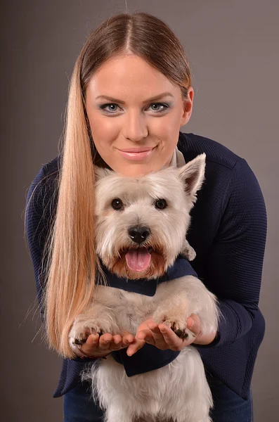 Westie en meisje — Stockfoto